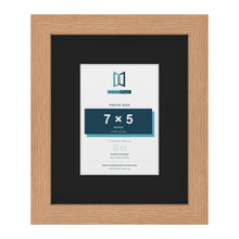 Oak 11 x 9 inch picture frame with a black mount for a 7 x 5 inch photo