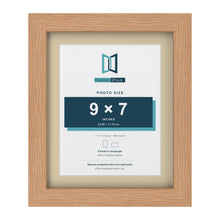 Oak 11 x 9 inch picture frame with an ivory mount for a 9 x 7 inch photo