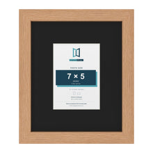 Oak 12 x 10 inch picture frame with a black mount for a 7 x 5 inch photo