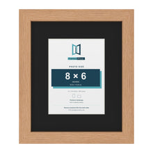 Oak 12 x 10 inch picture frame with a black mount for an 8 x 6 inch photo