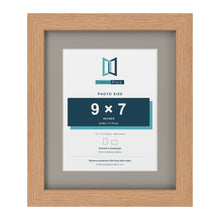 Oak 12 x 10 inch picture frame with a Dawn Grey mount for a 9 x 7 inch photo