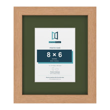 Oak 12 x 10 inch picture frame with a green mount for an 8 x 6 inch photo