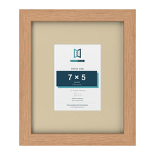 Oak 12 x 10 inch picture frame with an ivory mount for a 7 x 5 inch photo