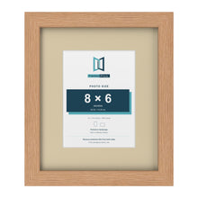 Oak 12 x 10 inch picture frame with an ivory mount for an 8 x 6 inch photo