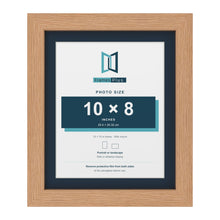 Oak 12 x 10 inch picture frame with a Pacific Blue mount for a 10 x 8 inch photo