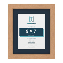 Oak 12 x 10 inch picture frame with a Pacific Blue mount for a 9 x 7 inch photo