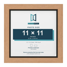 Oak 12 x 12 inch picture frame with a black mount for an 11 x 11 inch photo