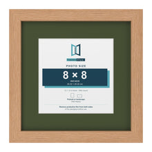 Oak 12 x 12 inch picture frame with a green mount for an 8 x 8 inch photo