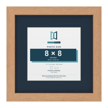 Oak 12 x 12 inch picture frame with a Pacific Blue mount for an 8 x 8 inch photo