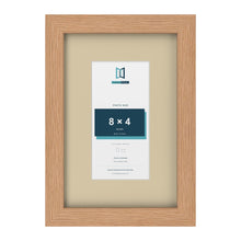 Oak 12 x 8 inch picture frame with an ivory mount for an 8 x 4 inch photo