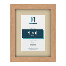 Oak 12 x 9 inch picture frame with an ivory mount for a 9 x 6 inch photo