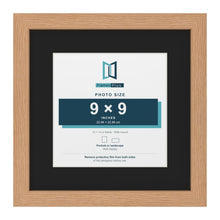 Oak 13 x 13 inch picture frame with a black mount for a 9 x 9 inch photo