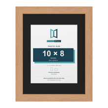 Oak 14 x 11 inch picture frame with a black mount for a 10 x 8 inch photo