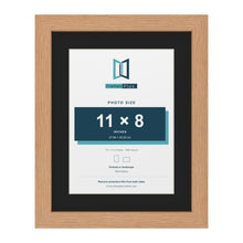 Oak 14 x 11 inch picture frame with a black mount for an 11 x 8 inch photo