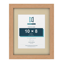 Oak 14 x 11 inch picture frame with an ivory mount for a 10 x 8 inch photo