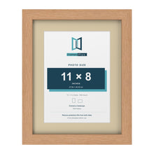 Oak 14 x 11 inch picture frame with an ivory mount for an 11 x 8 inch photo