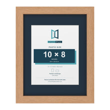 Oak 14 x 11 inch picture frame with a Pacific Blue mount for a 10 x 8 inch photo