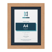 Oak 14 x 11 inch picture frame with a Pacific Blue mount for an A4 photo