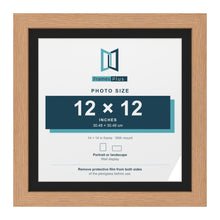 Oak 14 x 14 inch picture frame with a black mount for a 12 x 12 inch photo