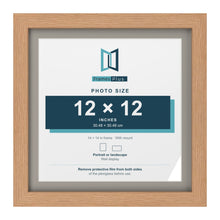 Oak 14 x 14 inch picture frame with a Dawn Grey mount for a 12 x 12 inch photo