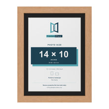 Oak 16 x 12 inch picture frame with a black mount for a 14 x 10 inch photo