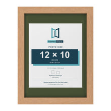 Oak 16 x 12 inch picture frame with a green mount for a 12 x 10 inch photo