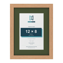Oak 16 x 12 inch picture frame with a green mount for a 12 x 8 inch photo