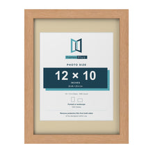 Oak 16 x 12 inch picture frame with an ivory mount for a 12 x 10 inch photo