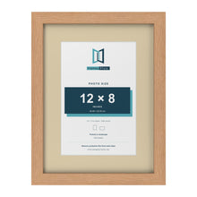 Oak 16 x 12 inch picture frame with an ivory mount for a 12 x 8 inch photo