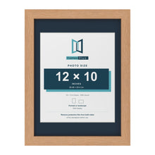 Oak 16 x 12 inch picture frame with a Pacific Blue mount for a 12 x 10 inch photo