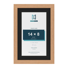 Oak 17 x 11 inch picture frame with a black mount for a 14 x 8 inch photo