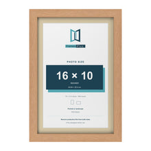 Oak 18 x 12 inch picture frame with an ivory mount for a 16 x 10 inch photo
