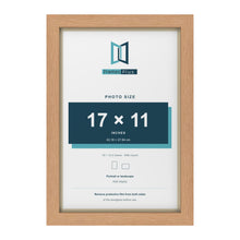 Oak 18 x 12 inch picture frame with an ivory mount for a 17 x 11 inch photo