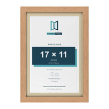 Oak 19 x 13 inch picture frame with an ivory mount for a 17 x 11 inch photo
