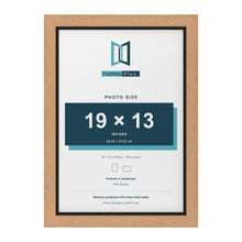 Oak 20 x 14 inch picture frame with a black mount for a 19 x 13 inch photo