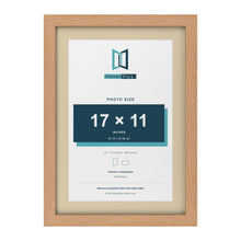 Oak 20 x 14 inch picture frame with an ivory mount for a 17 x 11 inch photo