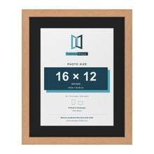 Oak 20 x 16 inch picture frame with a black mount for a 16 x 12 inch photo