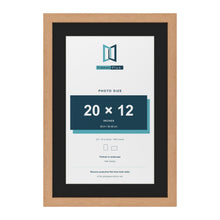 Oak 24 x 16 inch picture frame with a black mount for a 20 x 12 inch photo