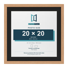 Oak 24 x 24 inch picture frame with a black mount for a 20 x 20 inch photo