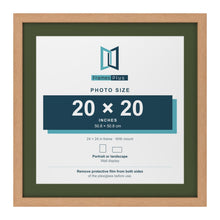 Oak 24 x 24 inch picture frame with a green mount for a 20 x 20 inch photo
