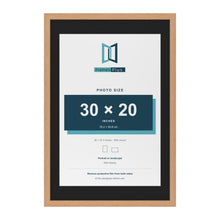 Oak 36 x 24 inch picture frame with a black mount for a 30 x 20 inch photo