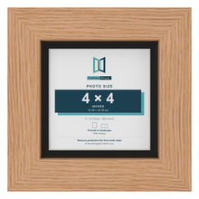 Oak 5 x 5 inch picture frame with a black mount for a 4 x 4 inch photo
