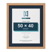 Oak 60 x 50 cm picture frame with a Pacific Blue mount for a 50 x 40 cm photo