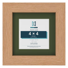 Oak 6 x 6 inch picture frame with a green mount for a 4 x 4 inch photo