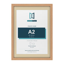 Oak 70 x 50 cm picture frame with an ivory mount for an A2 photo