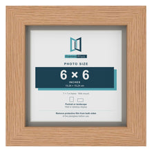 Oak 7 x 7 inch picture frame with a Dawn Grey mount for a 6 x 6 inch photo