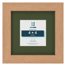 Oak 7 x 7 inch picture frame with a green mount for a 4 x 4 inch photo