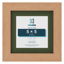 Oak 7 x 7 inch picture frame with a green mount for a 5 x 5 inch photo