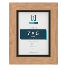 Oak 8 x 6 inch picture frame with a black mount for a 7 x 5 inch photo