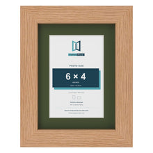 Oak 8 x 6 inch picture frame with a green mount for a 6 x 4 inch photo
